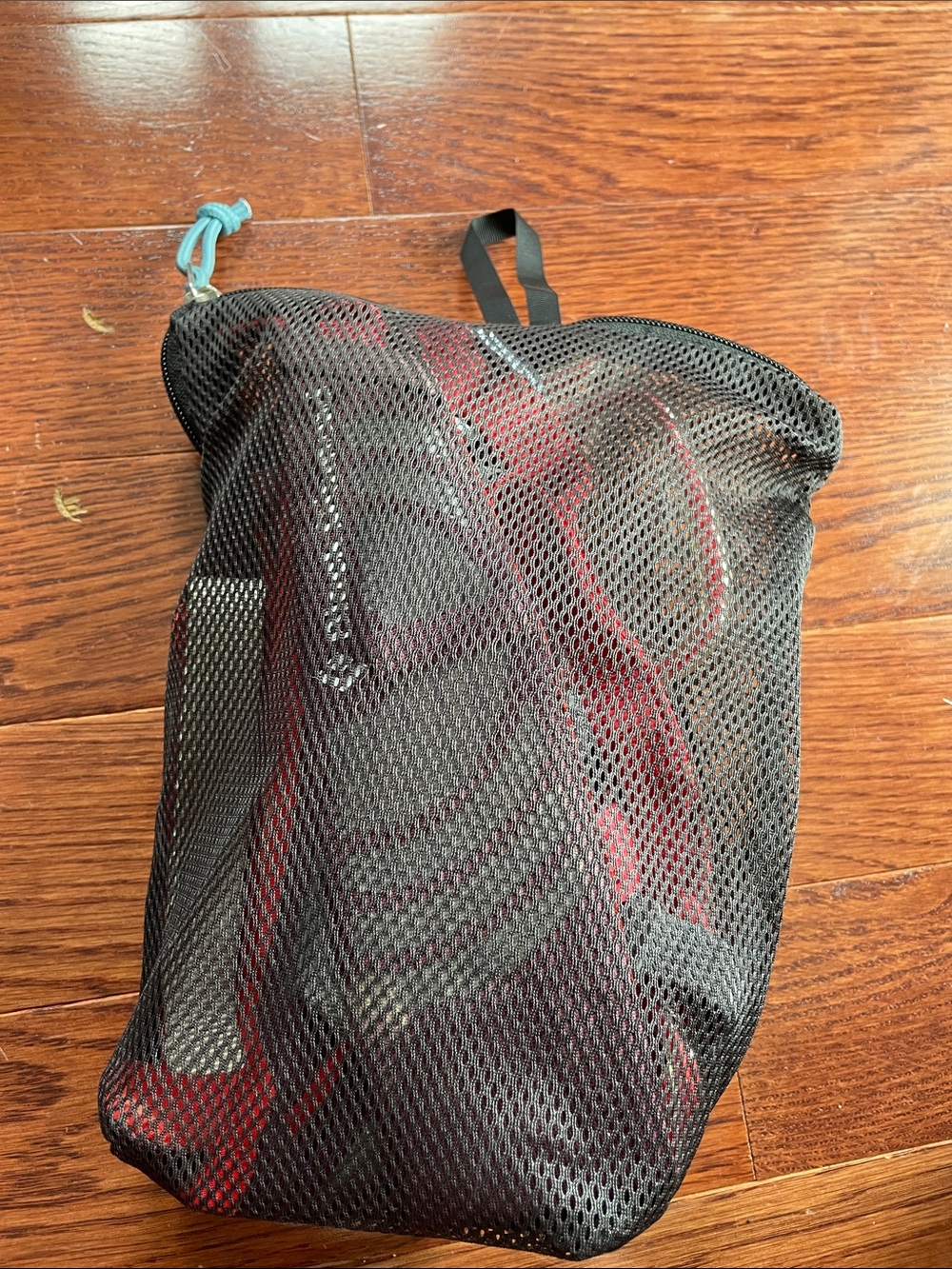 Black Diamond climbing harness with carrying mesh bag